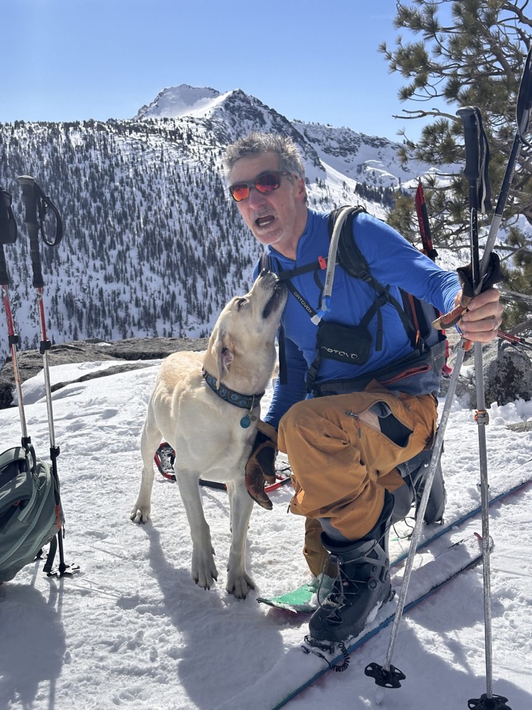 Jamie Morgan with his dog on Maggie's Peak